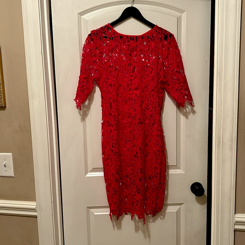 Small, red semi formal or casual dress.